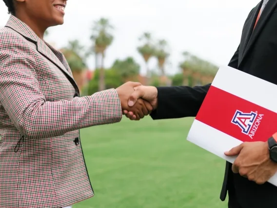 two people shaking hands