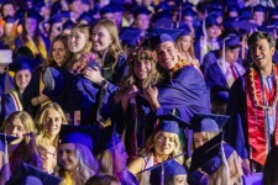 graduates celebrating at commencement