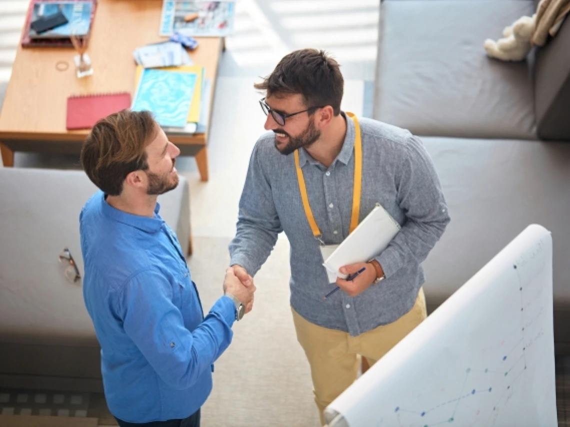 two people shaking hands